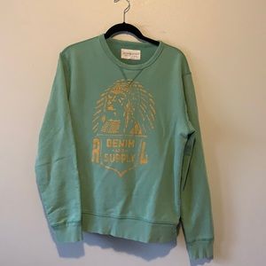 Green graphic sweater